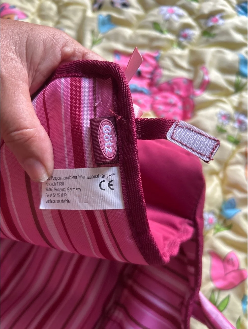 Götz Doll Carrier in Burgundy with Pink Floral Embroidery and Striped Interior